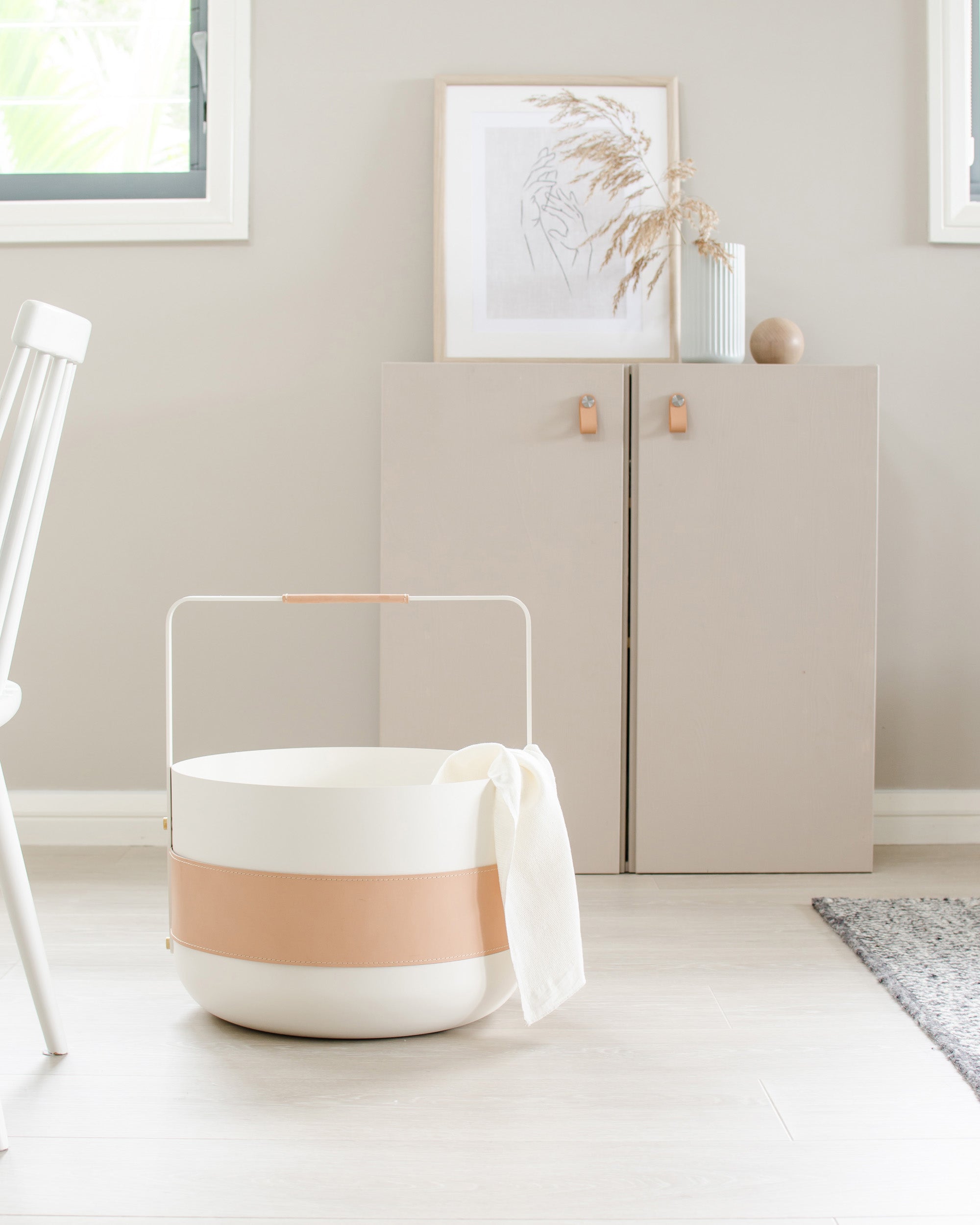 Eldvarm Emma Basket - Blanc in a styled interior setting