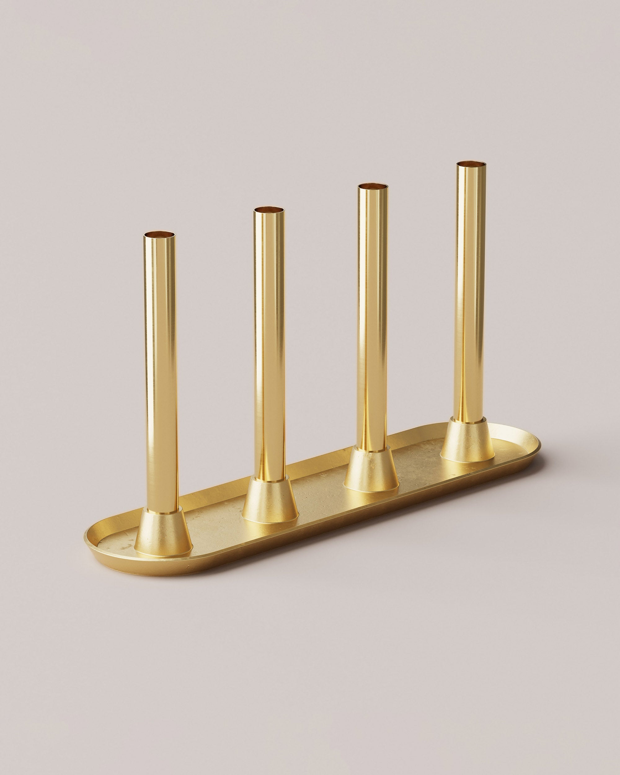 Eldvarm Reflet IV, candelabra in solid brass with sandcast base and polished tubes