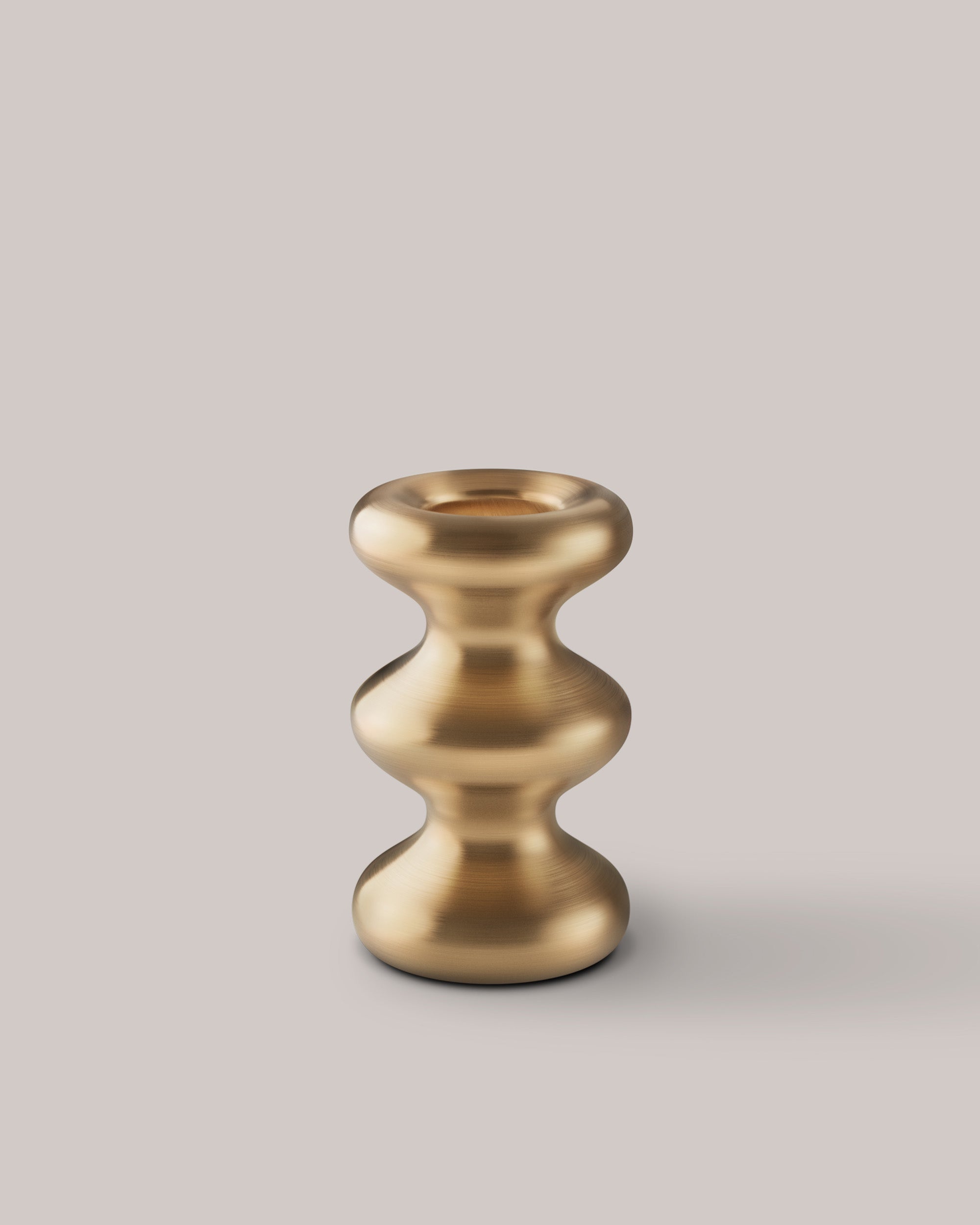Eldvarm LouLou Candle Holder - Brushed Brass, sculptural candle holder with ocean-ripple silhouette