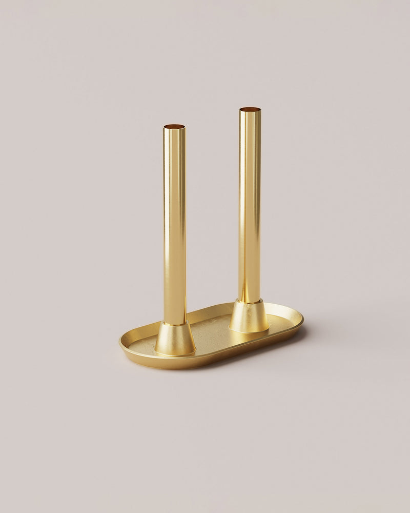 Eldvarm Reflet II, candelabra in solid brass with sandcast base and polished tubes