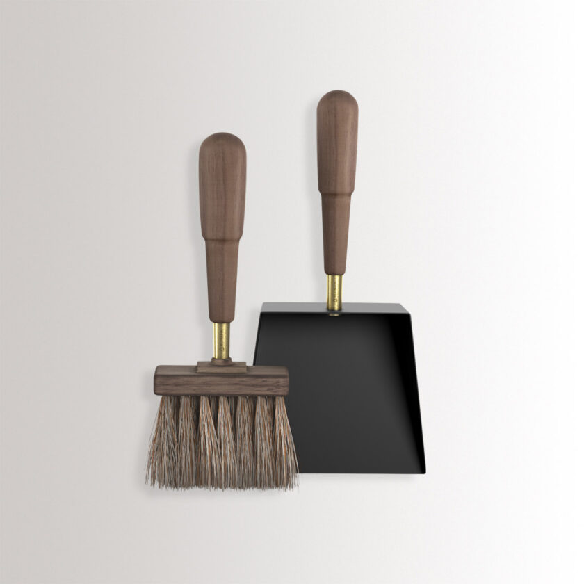 Emma Shovel & Brush in Graphite combines charcoal black powder-coated steel, with walnut wood and brass details.