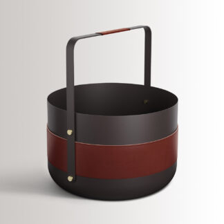 Emma Basket in Havane combines dark warm grey powder-coated steel, with brown-red leather and brass details.