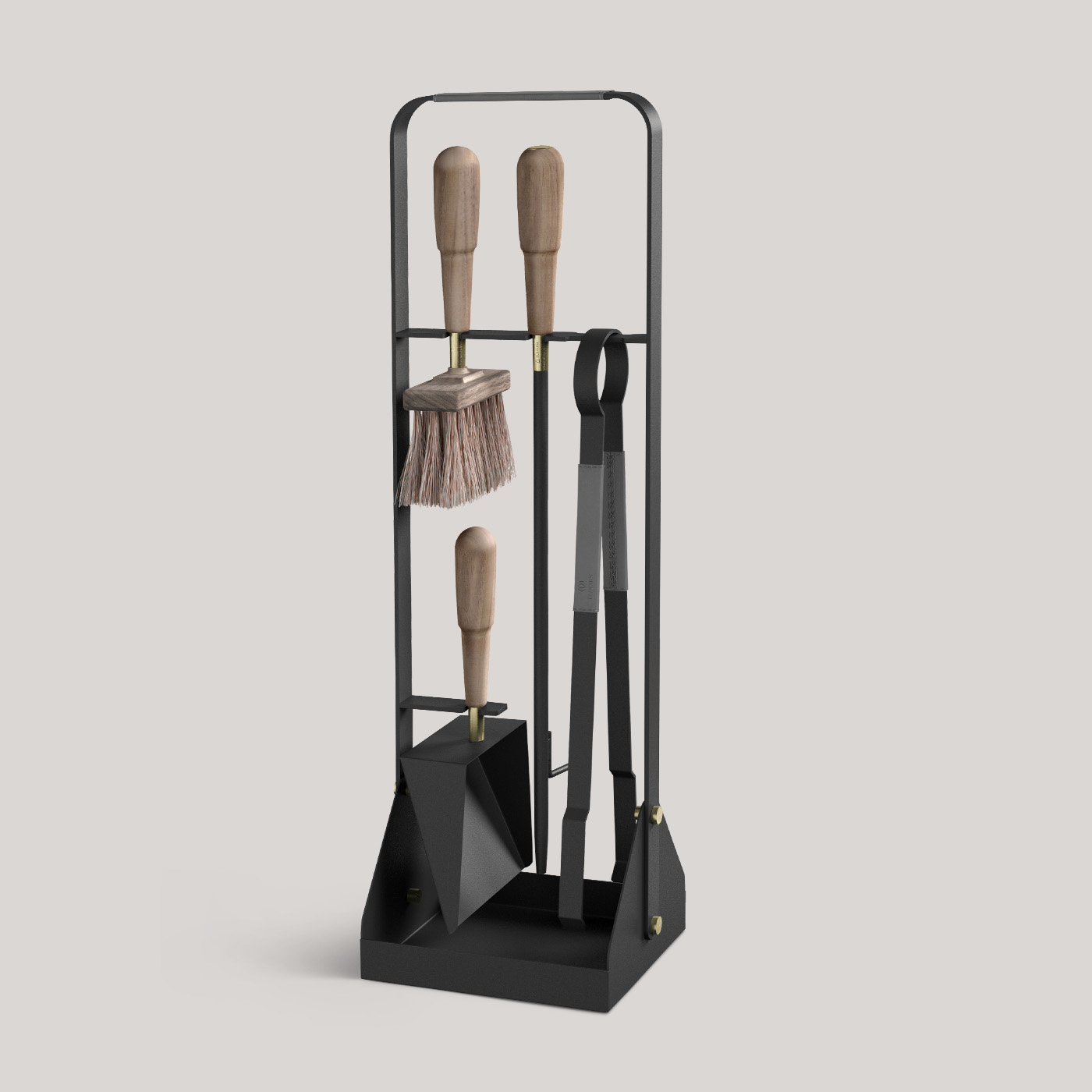 Emma Companion Set in Graphite combines charcoal black powder-coated steel, with “Ellie” grey leather, walnut wood handles and details in solid brass.