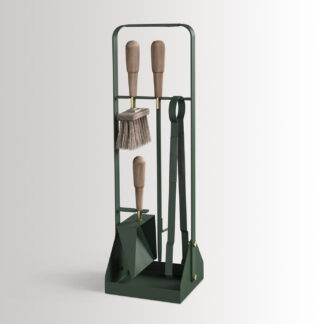 Emma Companion Set in Forêt combines British racing green powder-coated steel, with “Forêt” green leather, walnut wood handles and details in solid brass.