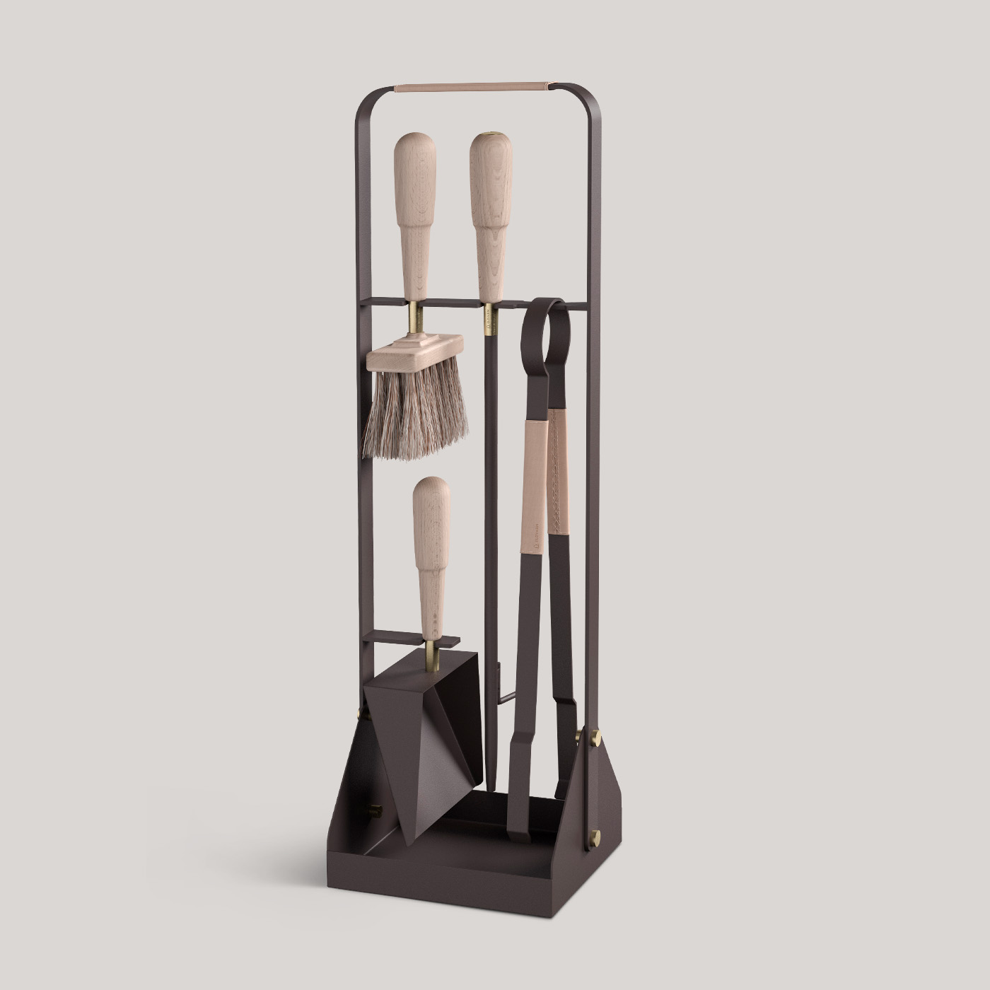 Emma Companion Set in Naturel combines dark warm grey powder-coated steel, with “Naturel” beige leather, beech wood handles and details in solid brass.