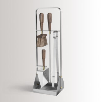 Emma Companion Set in Lumière combines stainless steel, with oiled walnut wood handles and details in solid brass.