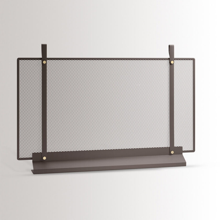 The large Emma fireplace screen in Classique combines dark warm grey powder-coated steel, with brass details.