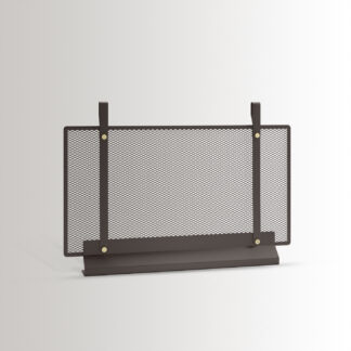 The small Emma fireplace screen in Classique combines dark warm grey powder-coated steel, with brass details.