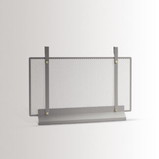 The small Emma fireplace screen in Paris combines medium grey powder-coated steel, with brass details.