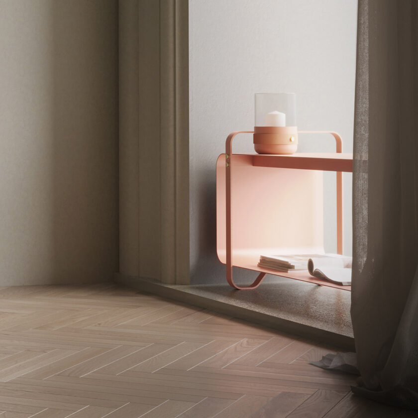 Emma Lantern in BonBon (peachy pink powder-coated steel, “Naturel” beige leather, hand blown glass and brass details) on a Ninne Bench in the same colour.