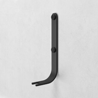 Emma Wall Hook in Noir is made of charcoal black powder-coated steel, with black details.
