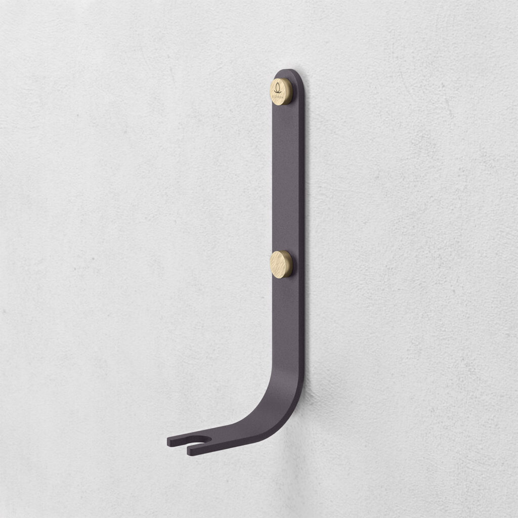 Emma Wall Hook in Classique is made of dark warm grey powder-coated steel, with brass details.