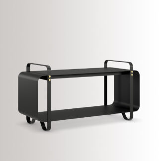 Ninne Bench in Noir is made from charcoal black powder-coated steel, with brass details, at an angle.