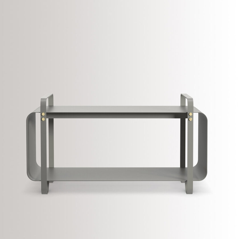 The outdoor version of the Ninne Bench in Paris combines medium grey powder-coated galvanised steel, with brass details.