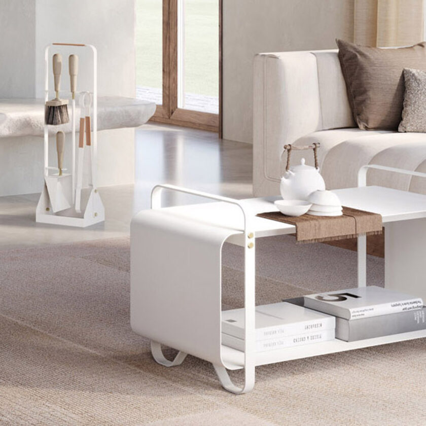 Ninne Bench and Emma Companion. Set in white (Blanc) in a living room. Ninne Bench is holding books inside of it with a tea pot and bowls on top.
