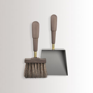 Emma Shovel & Brush in Paris combines medium grey powder-coated steel, with walnut wood and brass details.