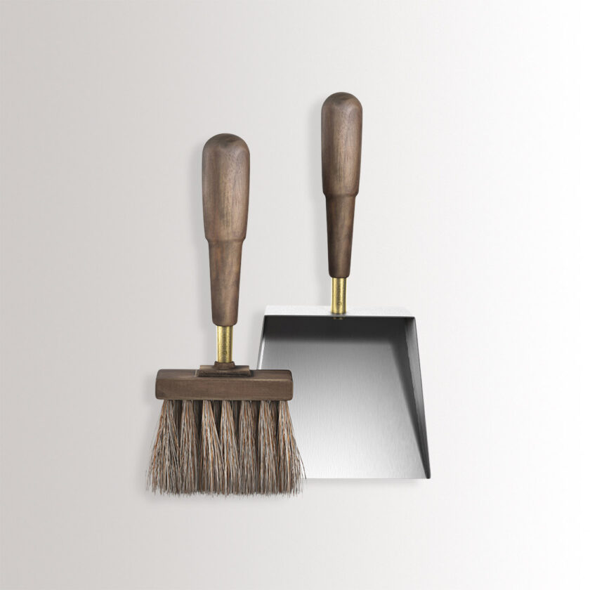 Emma Shovel & Brush in Lumière combines stainless steel, with oiled walnut wood and brass details.
