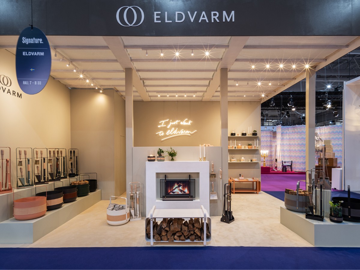 Maison et Objet Fair 2023 showing Eldvarm's stand. Different versions of the Emma Series (Basket, Companion Set, Firescreen), Ninne Bench, and Lucie Candle Holders with fireplace in the middle.