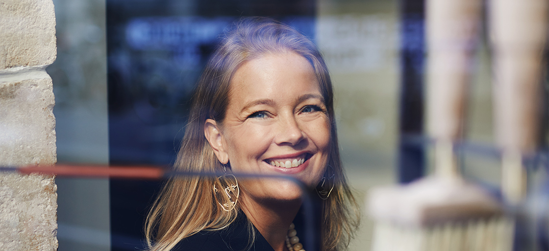 Founder of Eldvarm, Louise Varre smiling at the camera.