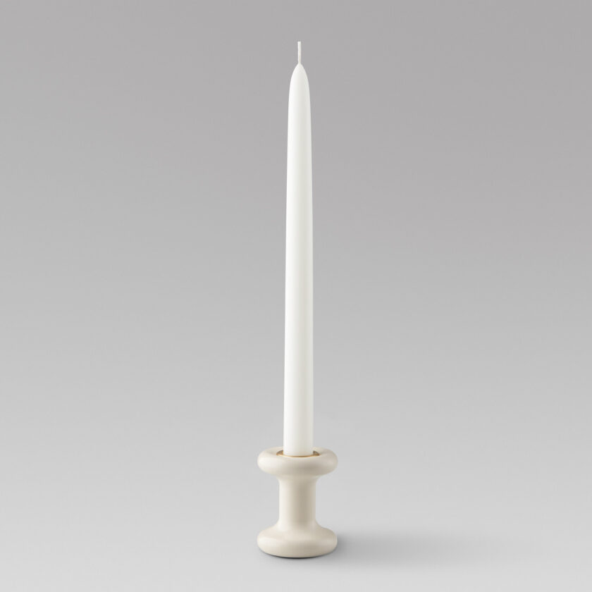 Lucie candle holder short in Blanc (white powder-coated steel) with a brass insert and unlit candle.