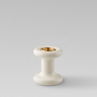 Lucie candle holder short in Blanc (white powder-coated steel) with a brass insert without a candle.
