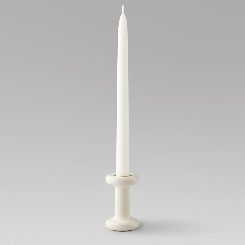 Lucie candle holder tall in Blanc (white powder-coated steel) with a brass insert and unlit candle.