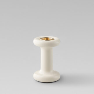 Lucie candle holder tall in Blanc (white powder-coated steel) with a brass insert without a candle.