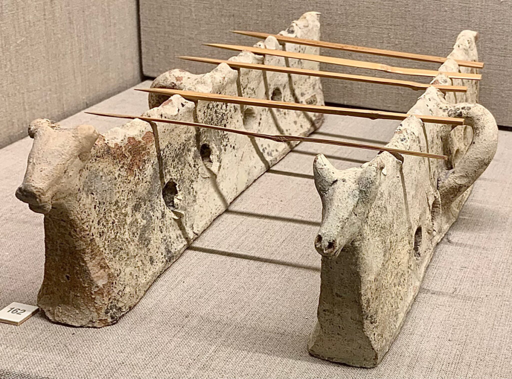 A pair of carved stone andirons dating back to the 17th century. Discovered at Akrotiri on the Greek island of Santorini.