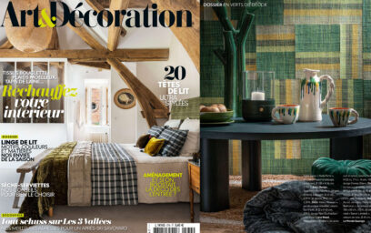 On the right a screen shot of the cover of the January-February issue of Art & Décoration magazine. On the right is a scene of various home wares most in a shade of green. The Emma Lantern in Foret is sitting on the coffee table.