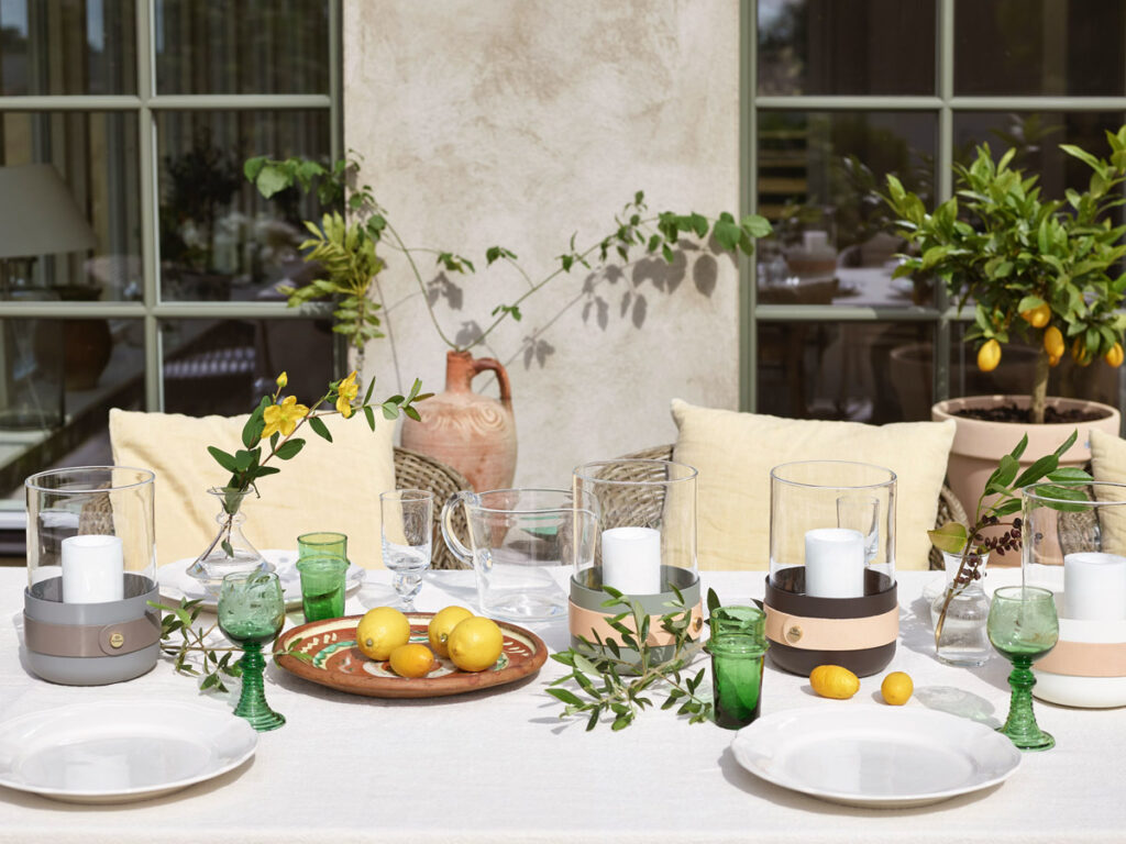 Mix of Emma Lanterns on an alfresco table setting