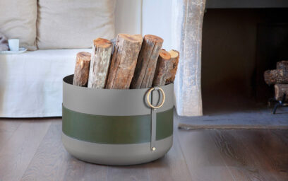 Emma Basket XL in Olive green colour. holding logs